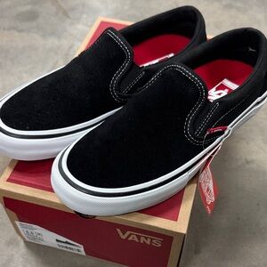 Vans Black and White Slip-On Shoes
